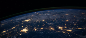 earth from space with the lights of cities visible